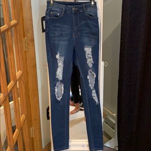 SUPER high waisted ripped jeans sz 7/8